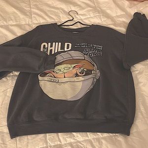 Cozy gray sweatshirt with baby yoda grogu from the mandalorian on it